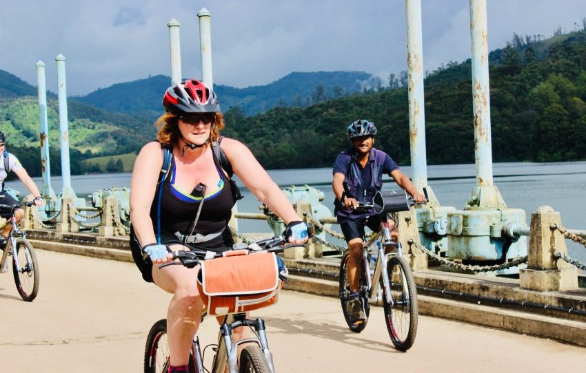 Women-cycling-letchmi-village-munnar-(1).jpg