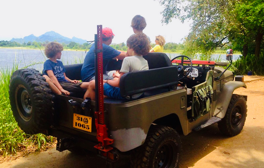 culture-trip-in-an-open-top-jeep-with-a-villager