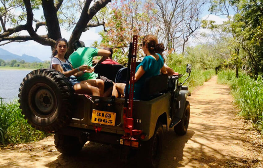 culture-trip-in-an-open-top-jeep-with-a-villager